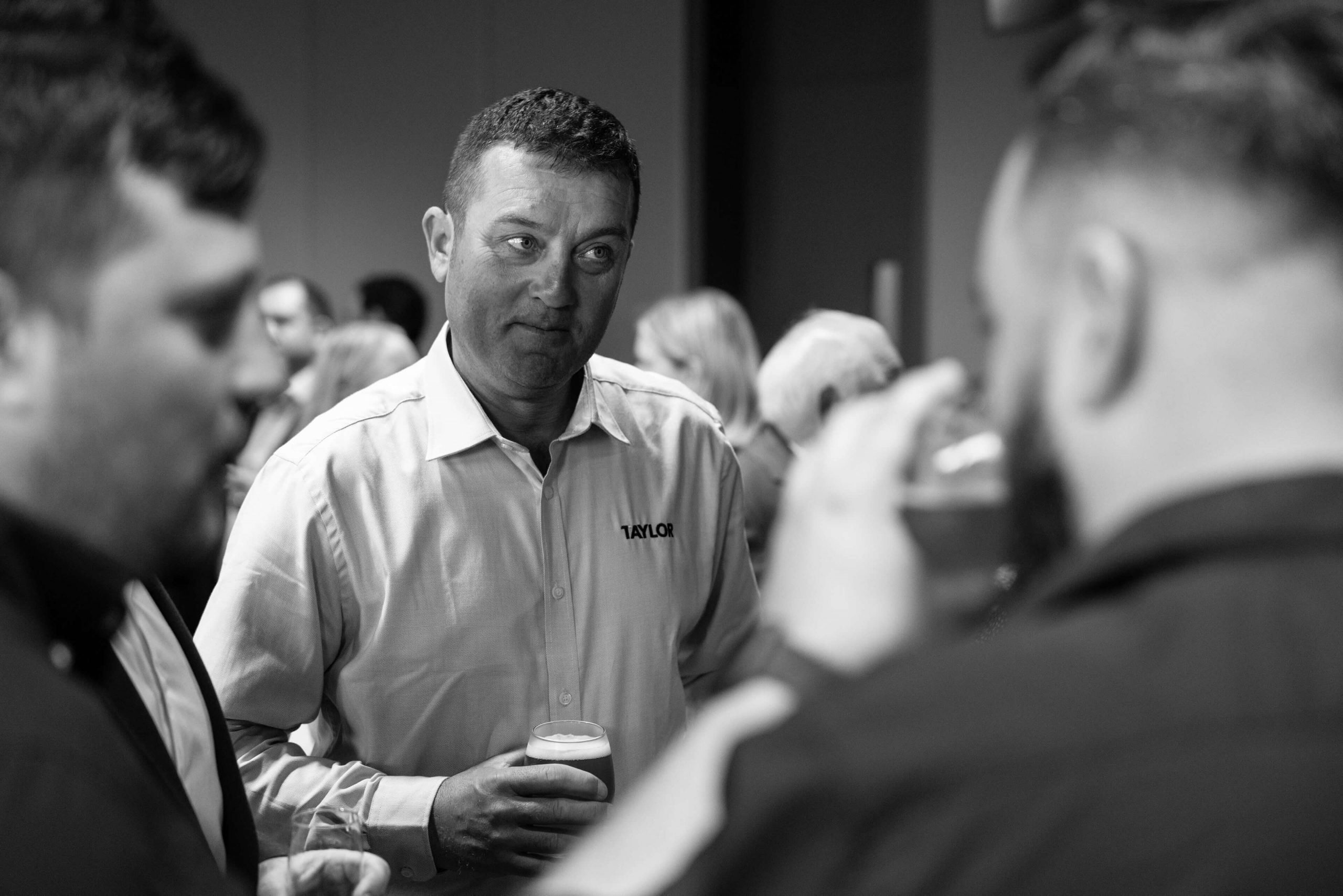 002 black and white image of team taylor in conversation aib awards 2022