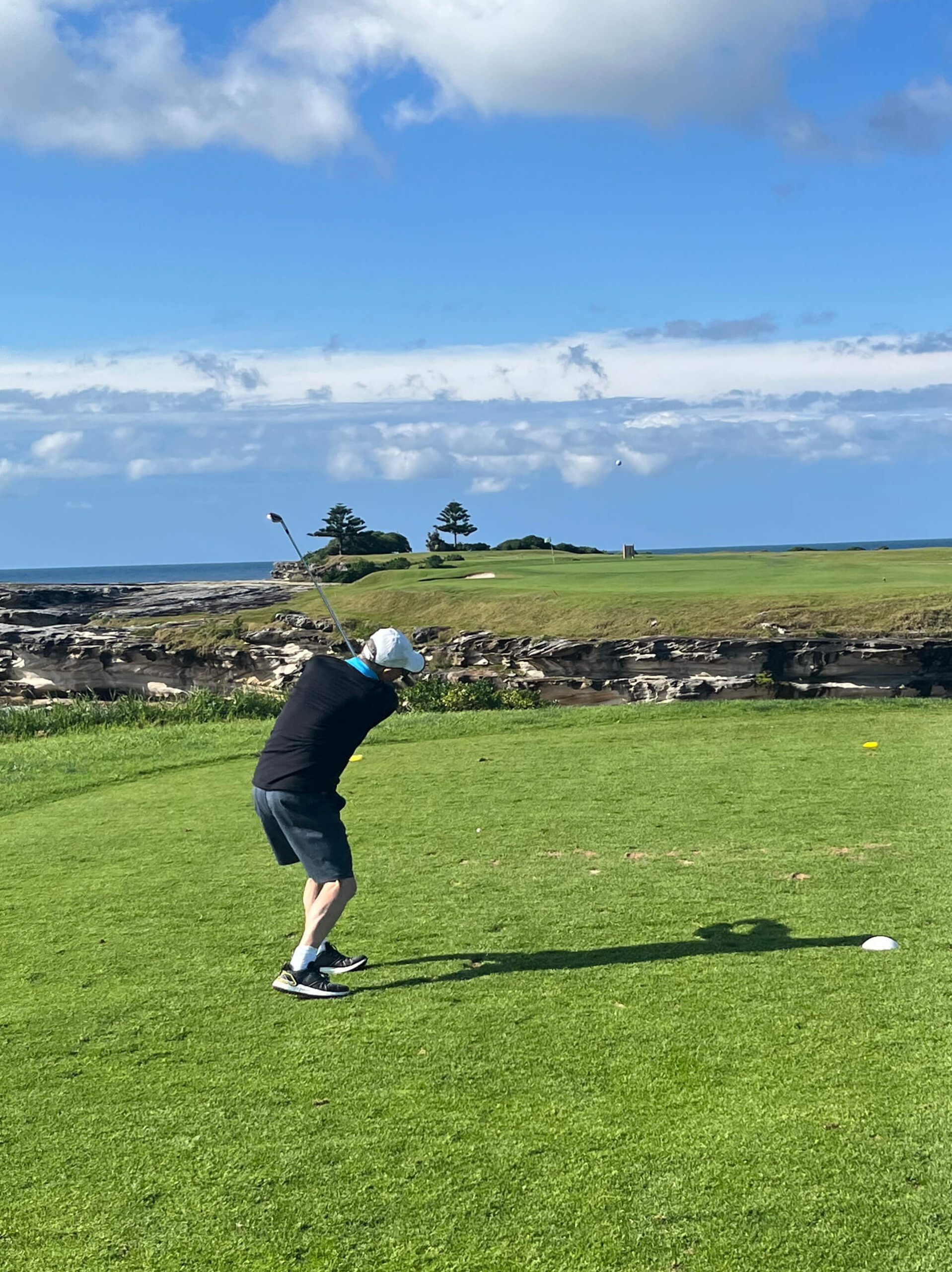 003 kari corporate golf day team taylor taking a swing