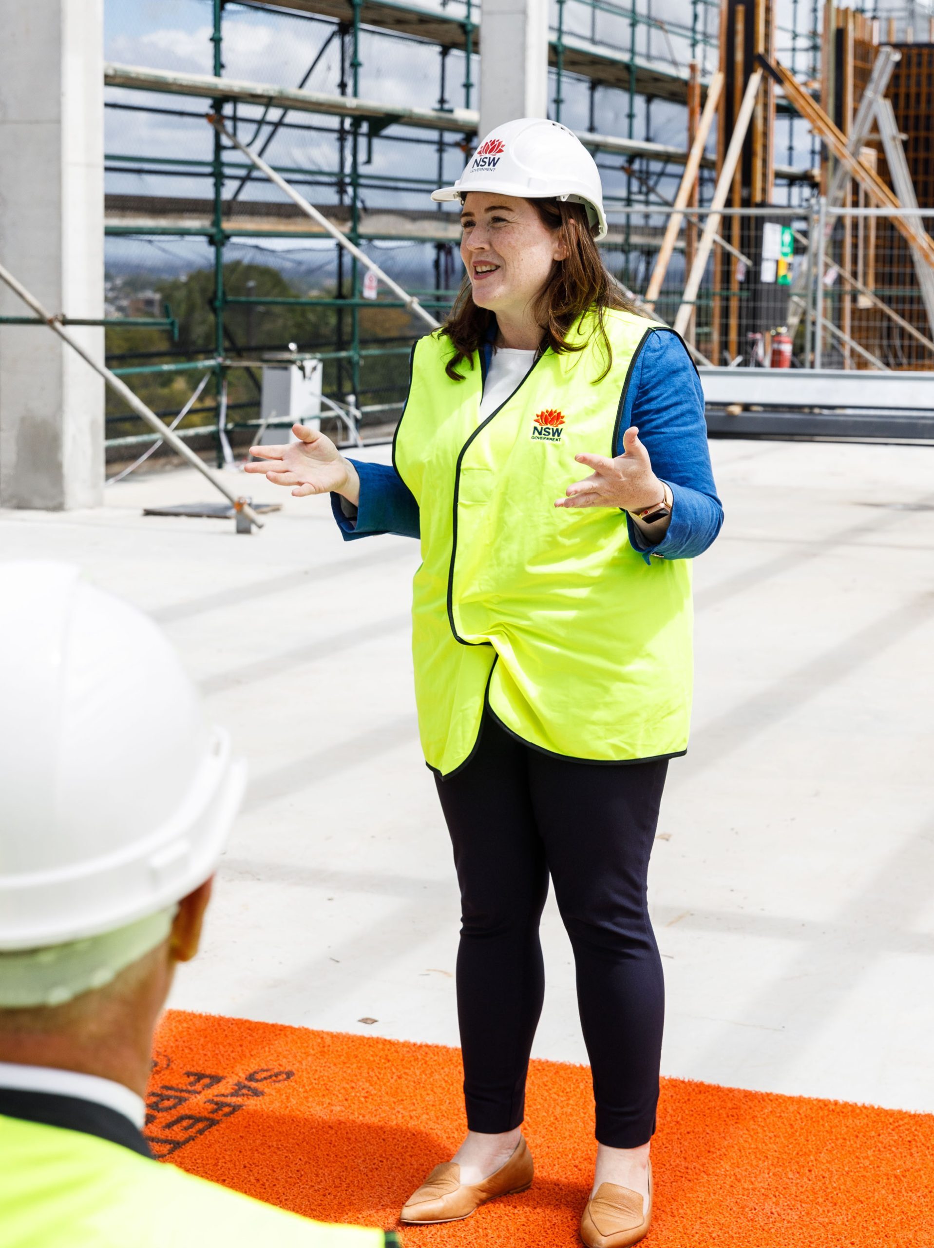004 female guest speaker addresses crowd at north sydney public school refurbishment and live environments taylor