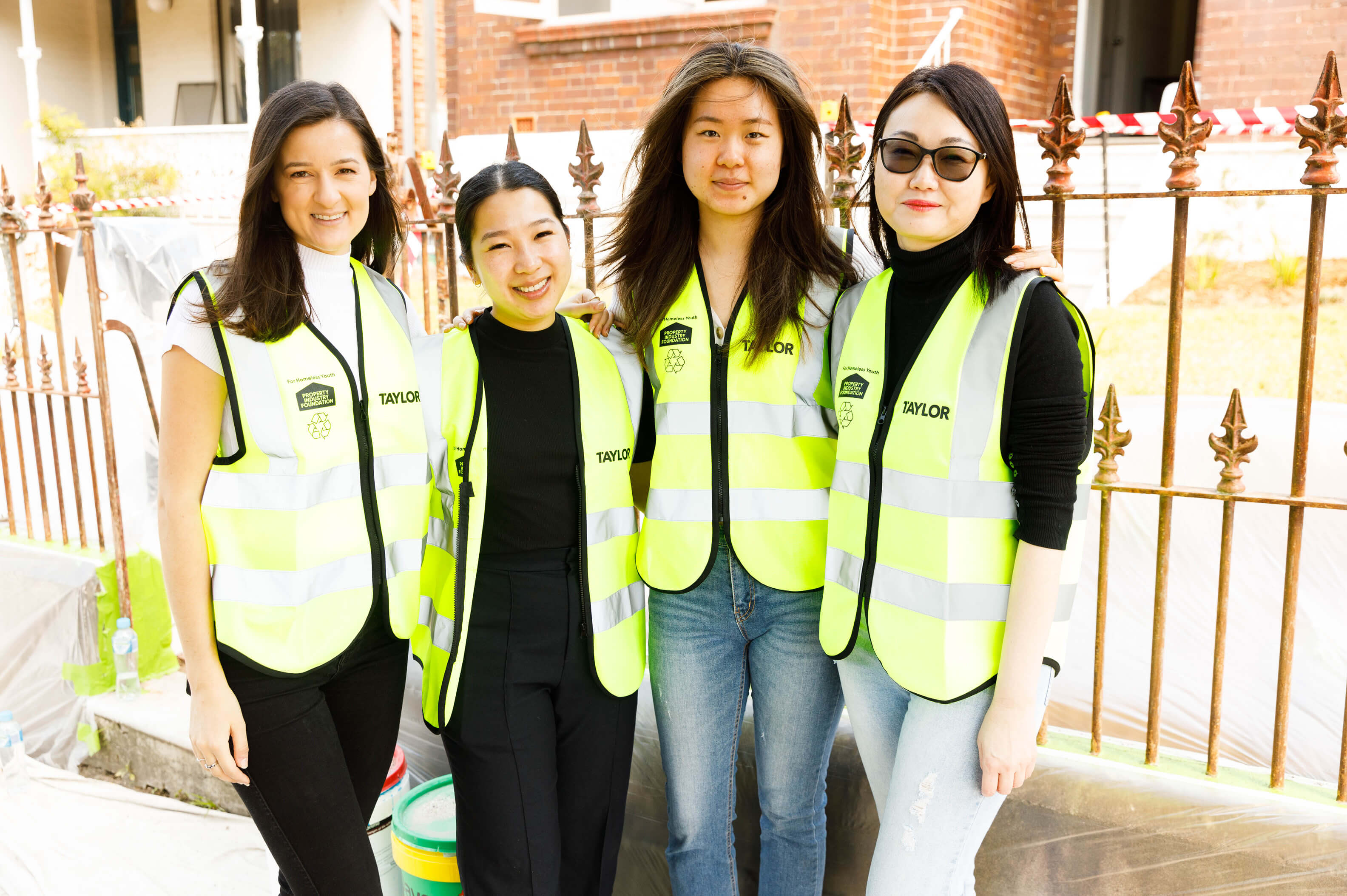 03 team portrait outside front gate taylor news article property industry foundation haven house in dulwich hill