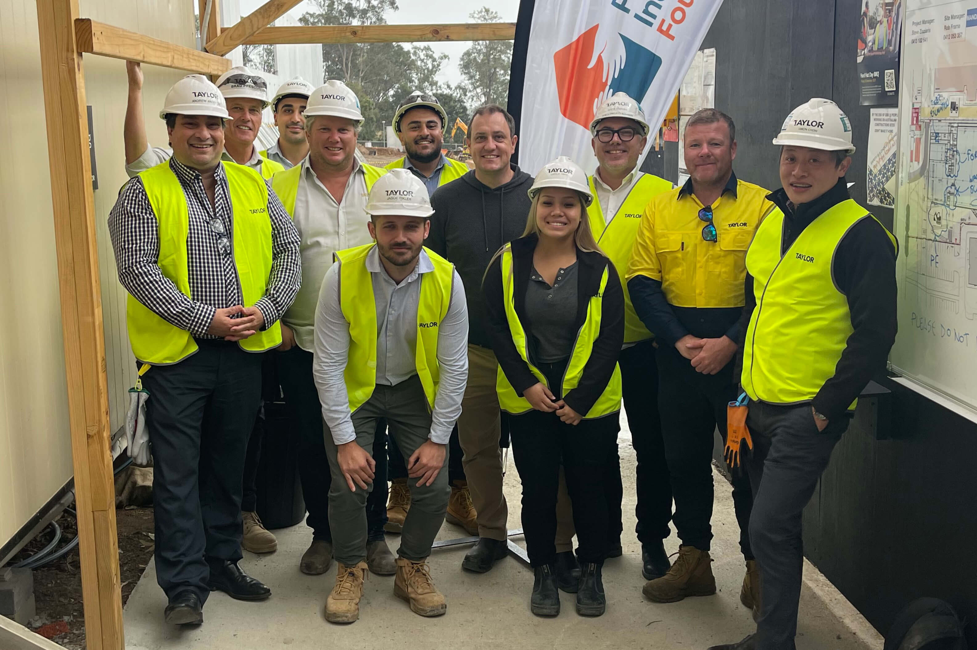 07 team taylor group shot taylor news article property industry foundation hard hat day