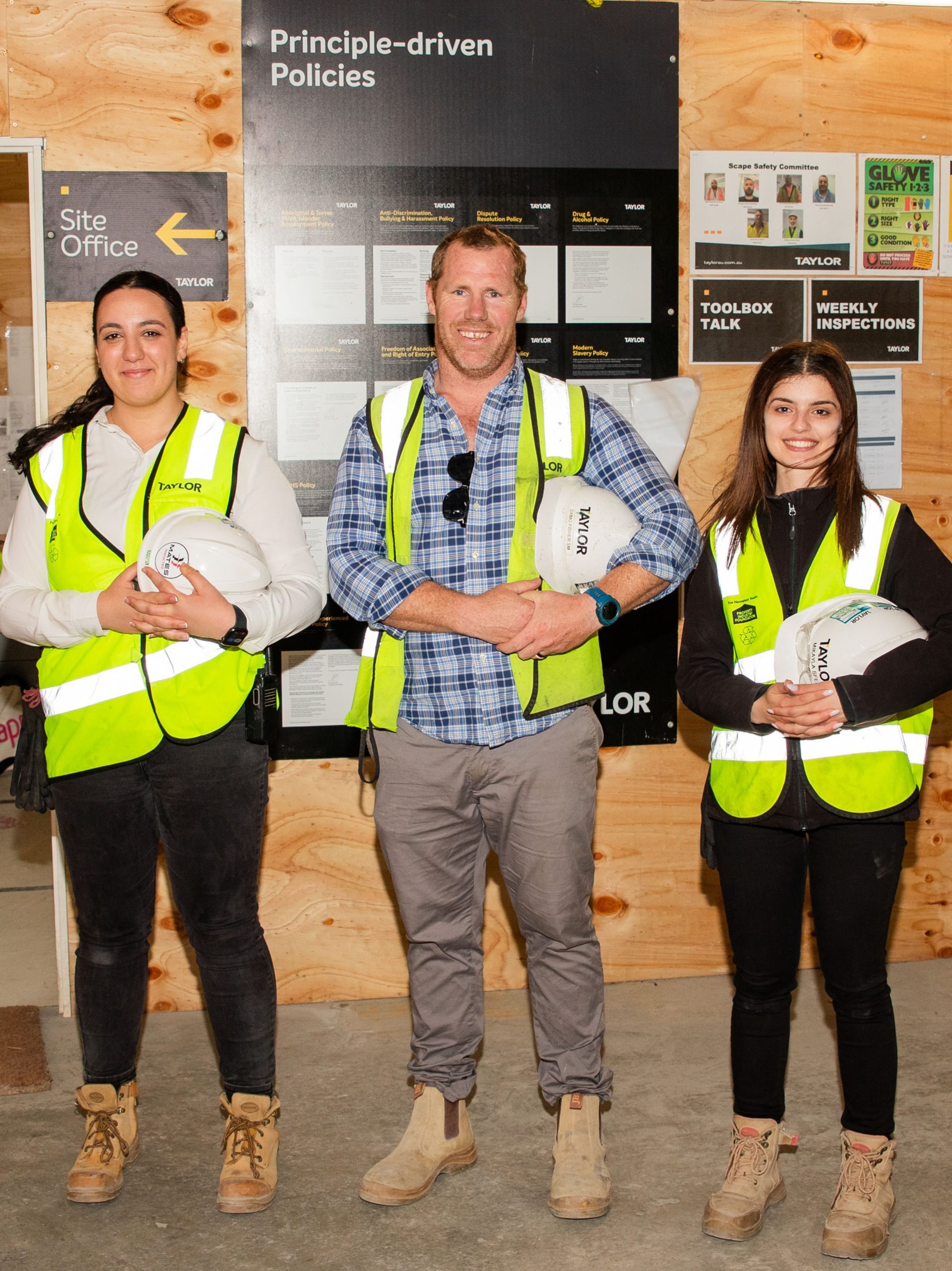 3 females with damian fisher 10 year anniversary taylor construction employee recognition milestone